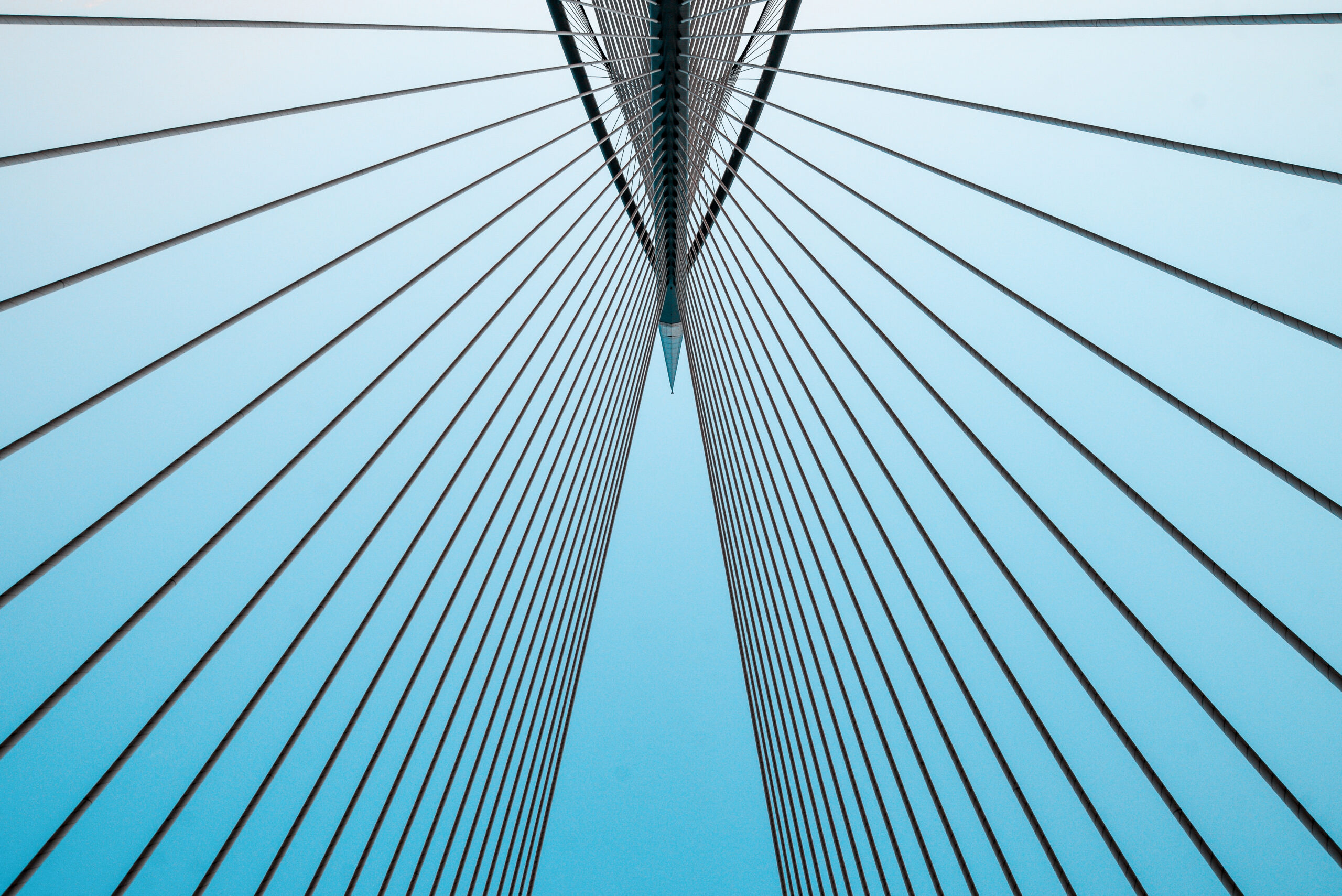 low-angle-view-suspension-bridge-against-sky